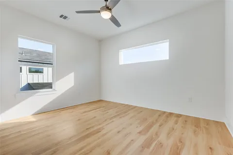 a view of a hallway with washer and dryer