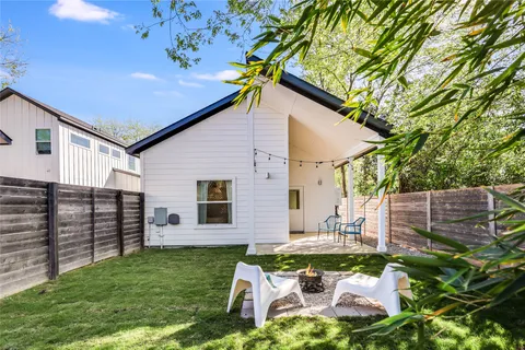 a view of a backyard with plants