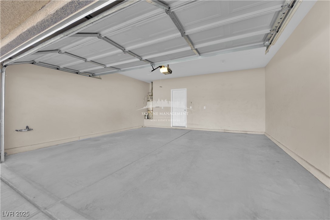 8661 Rowland Bluff Avenue Las Vegas, NV 89178 - Photo 33 of 37 View of garage