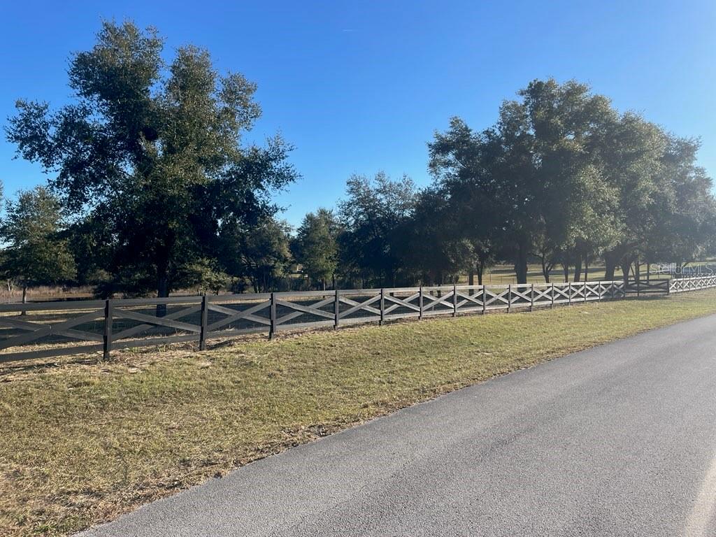 Hunters Trace Lane Clermont, FL 34715 - Photo 11 of 16 a view of a swimming pool with an outdoor seating