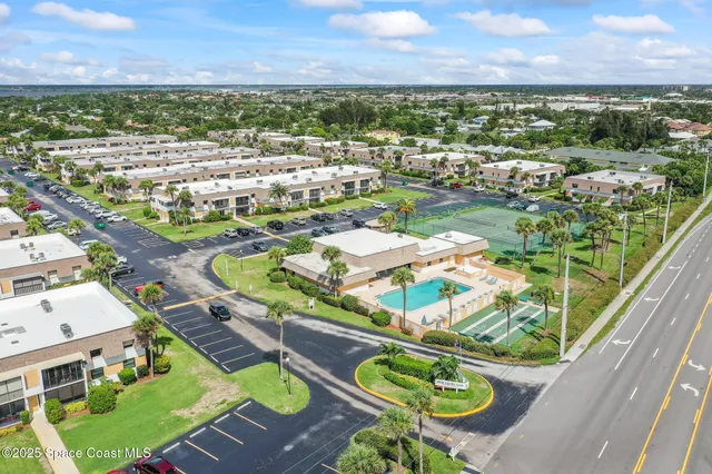 a view of a balcony with chairs