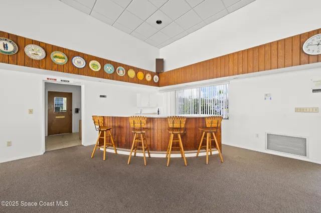 a bed room with a bed and a table