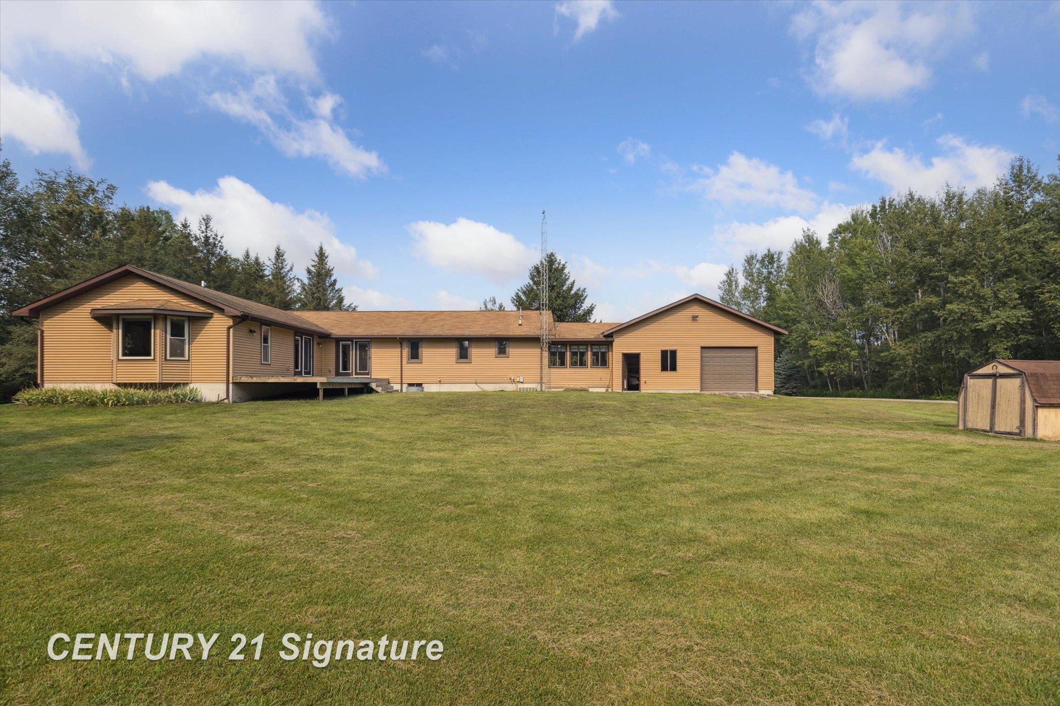 132 North 9 Mile Road Midland, MI 48640 - Photo 63 of 84 Back view of the house