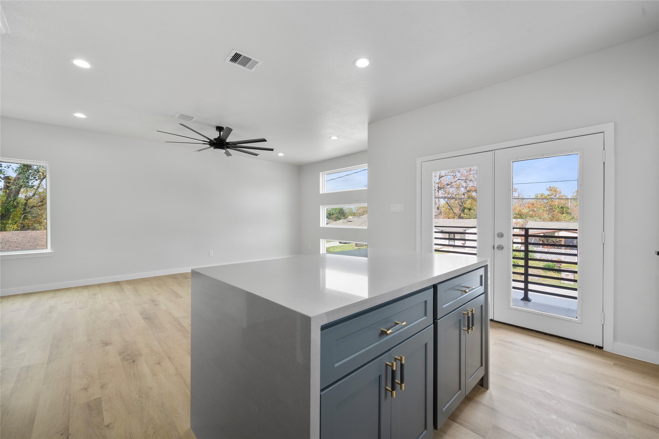 7220 South Hall Street, Unit B Houston, TX 77028 - Photo 14 of 34 a kitchen with a refrigerator and windows