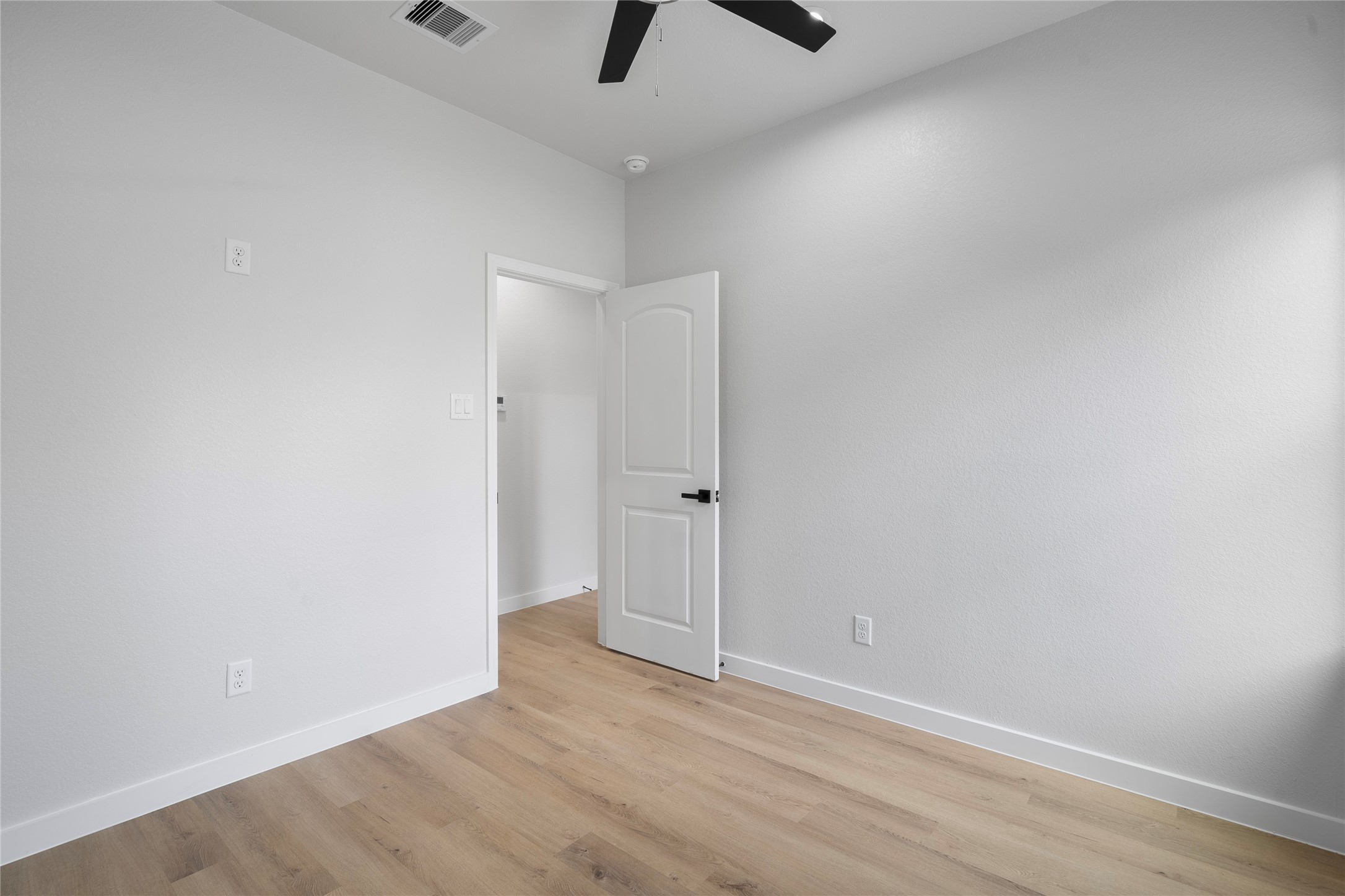 7220 South Hall Street, Unit B Houston, TX 77028 - Photo 22 of 34 wooden floor in an empty room