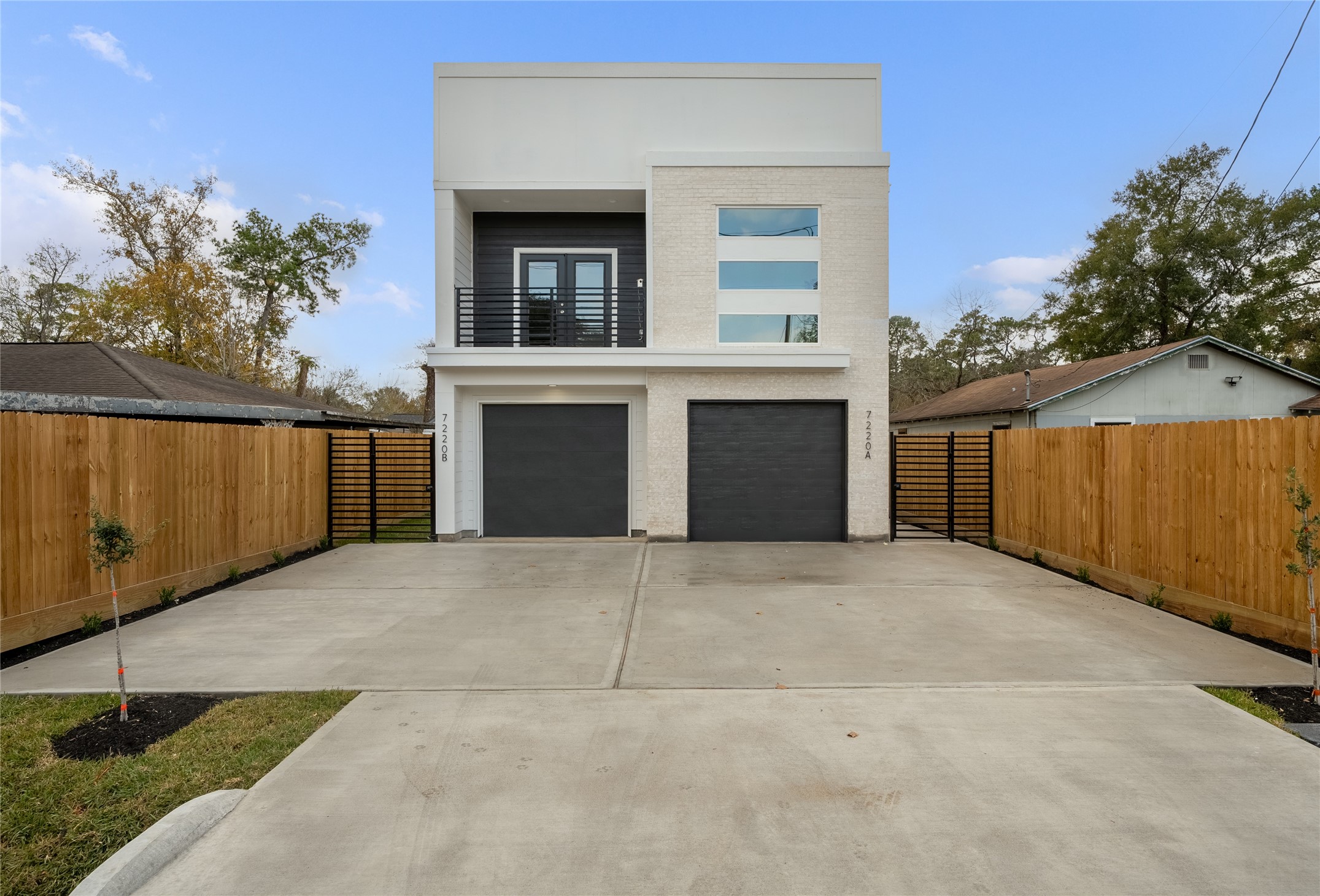 7220 South Hall Street, Unit B Houston, TX 77028 - Photo 3 of 34 front view of a house with a garage