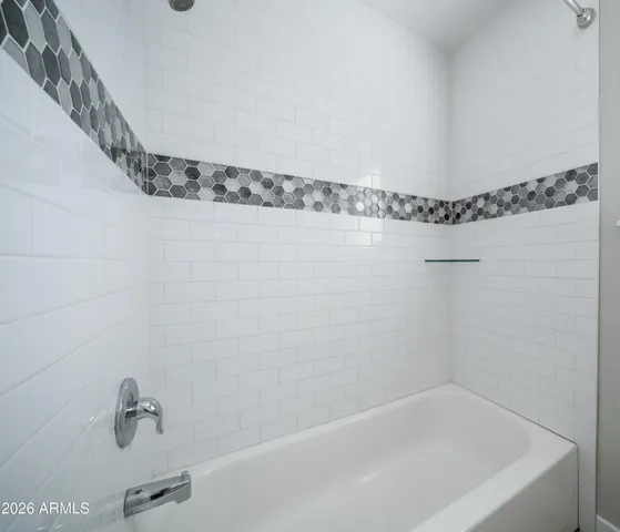 a bathroom with a bathtub