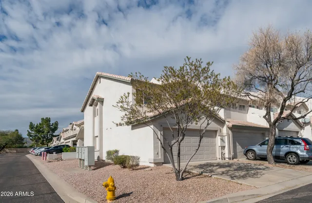 a street view with tall house