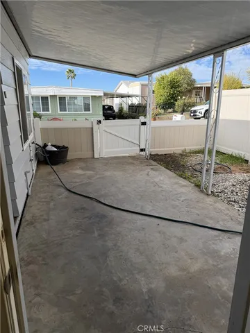 a view of a living room and a garage