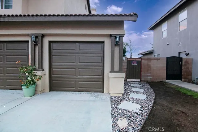 a view of a patio with a yard