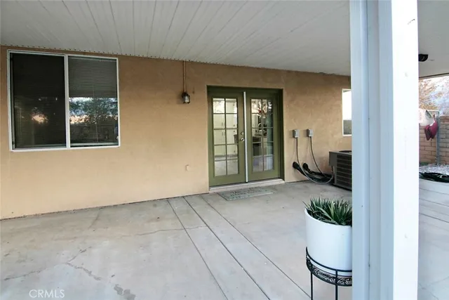a bathroom with a sink mirror and vanity