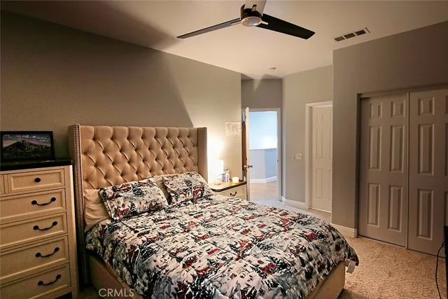 a close view of light fixtures and a mirror on a dresser