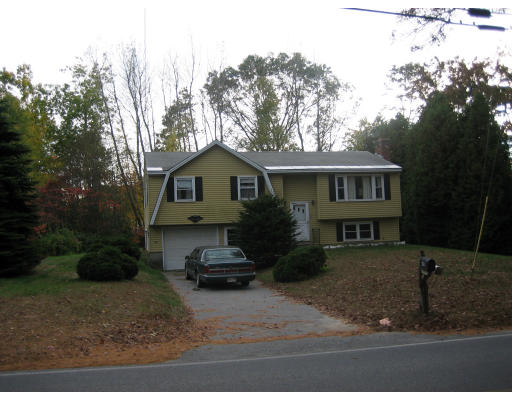60 Lancaster Road Clinton, MA 01510 - Photo 3 of 3 a view of a house with a yard