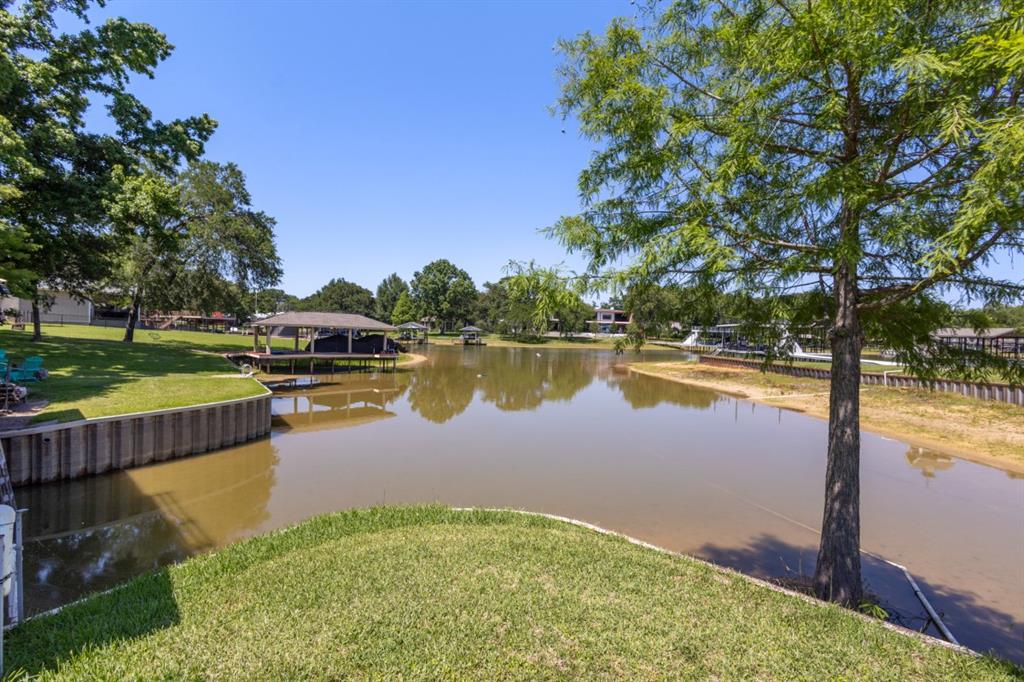 227 Scenic Road Trinidad, TX 75163 - Photo 33 of 40 a view of a lake with an outdoor space