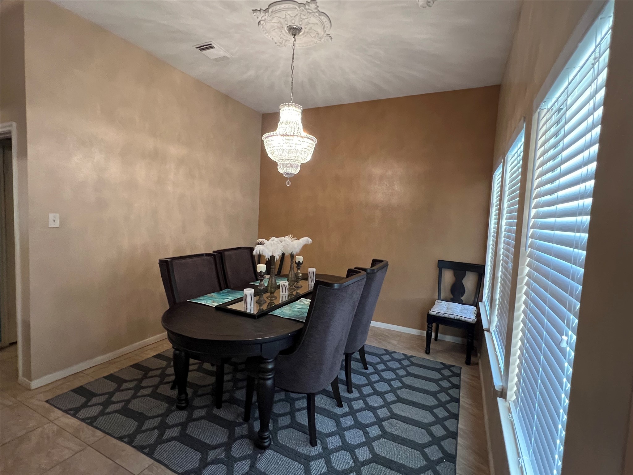 22814 Tree House Lane Spring, TX 77373 - Photo 10 of 11 a view of a dining room with furniture and wooden floor