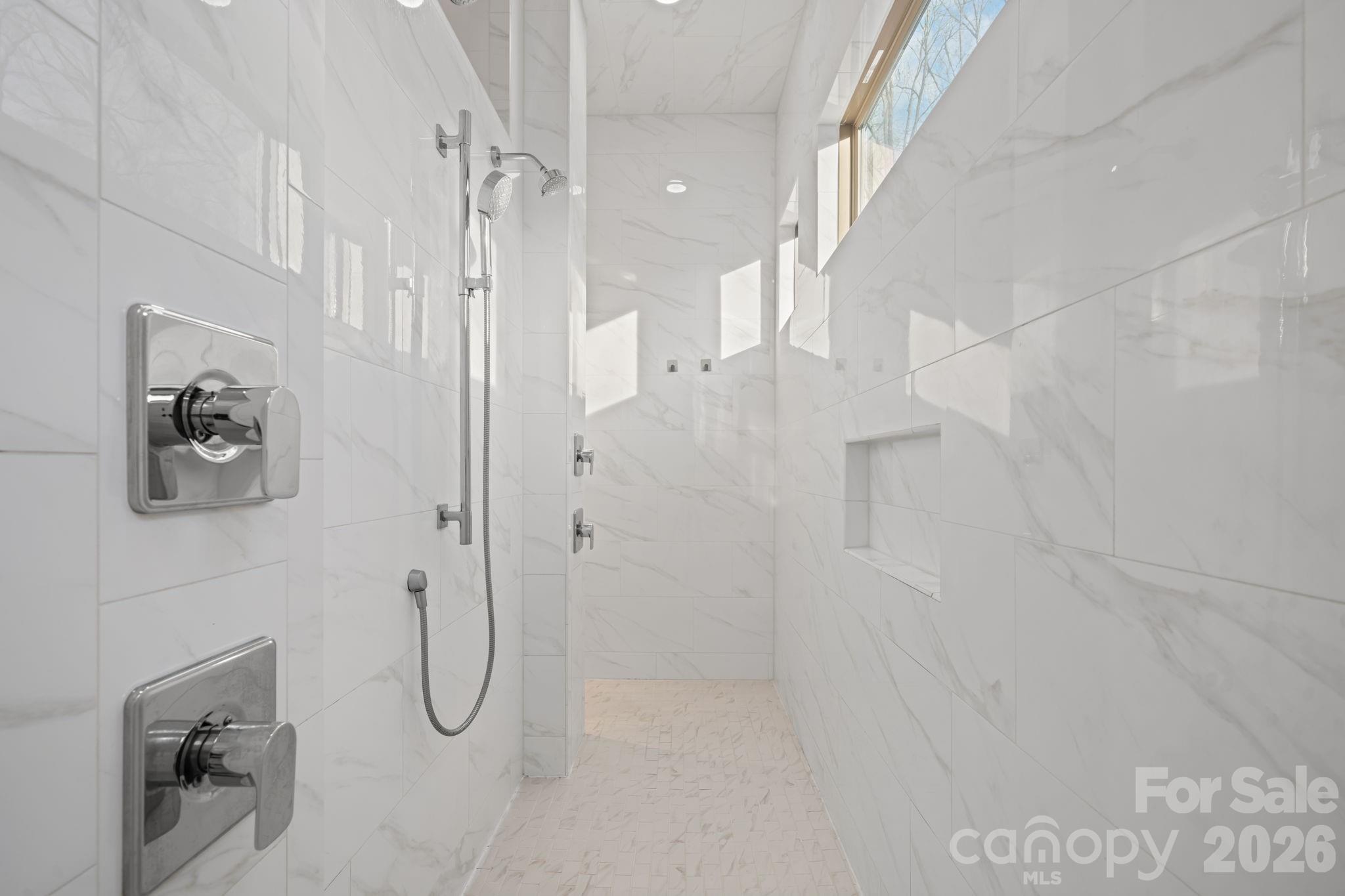 7269 Savannah Denver, NC 28037 - Photo 19 of 48 a bathroom with a shower