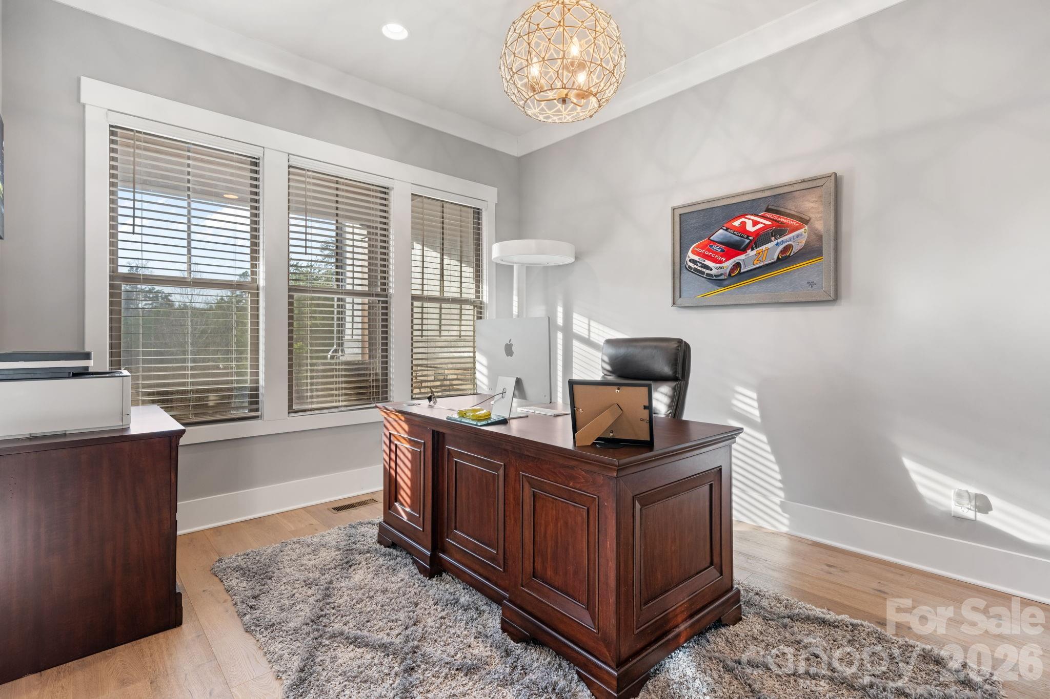 7269 Savannah Denver, NC 28037 - Photo 24 of 48 a view of a workspace with furniture and a window