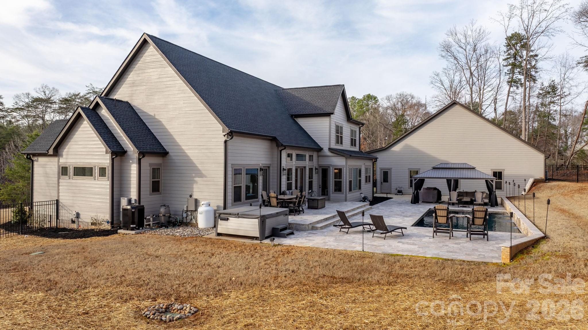 7269 Savannah Denver, NC 28037 - Photo 37 of 48 a view of a house with backyard and sitting area
