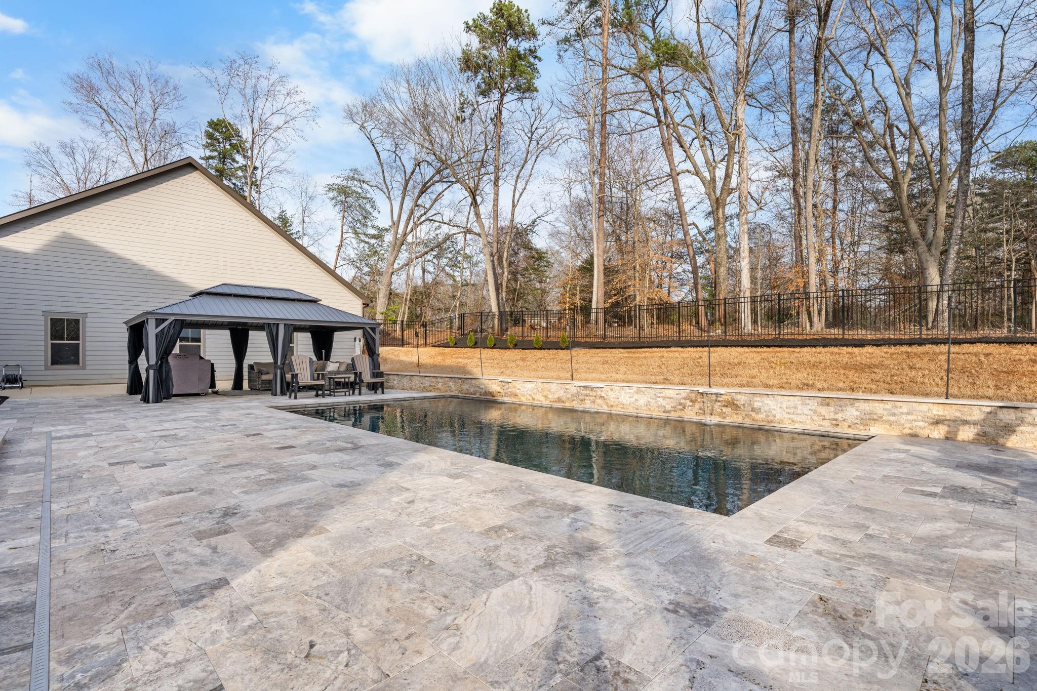 7269 Savannah Denver, NC 28037 - Photo 40 of 48 a view of a house with swimming pool