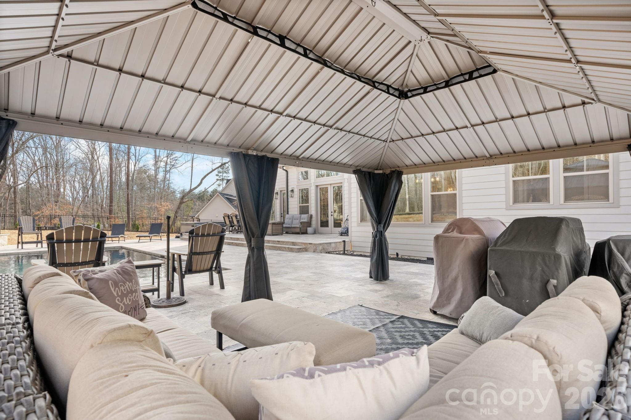 7269 Savannah Denver, NC 28037 - Photo 41 of 48 a living room with furniture a large window with outer view