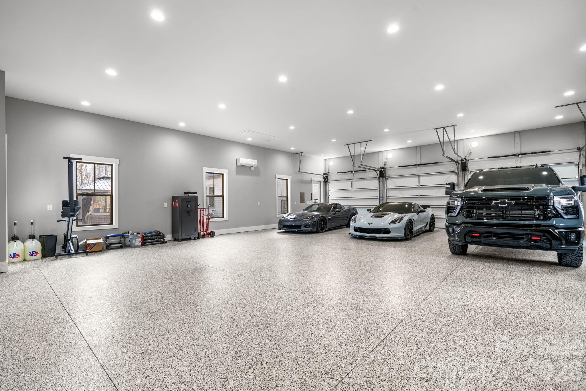 7269 Savannah Denver, NC 28037 - Photo 43 of 48 a view of a room with gym equipment and a large window