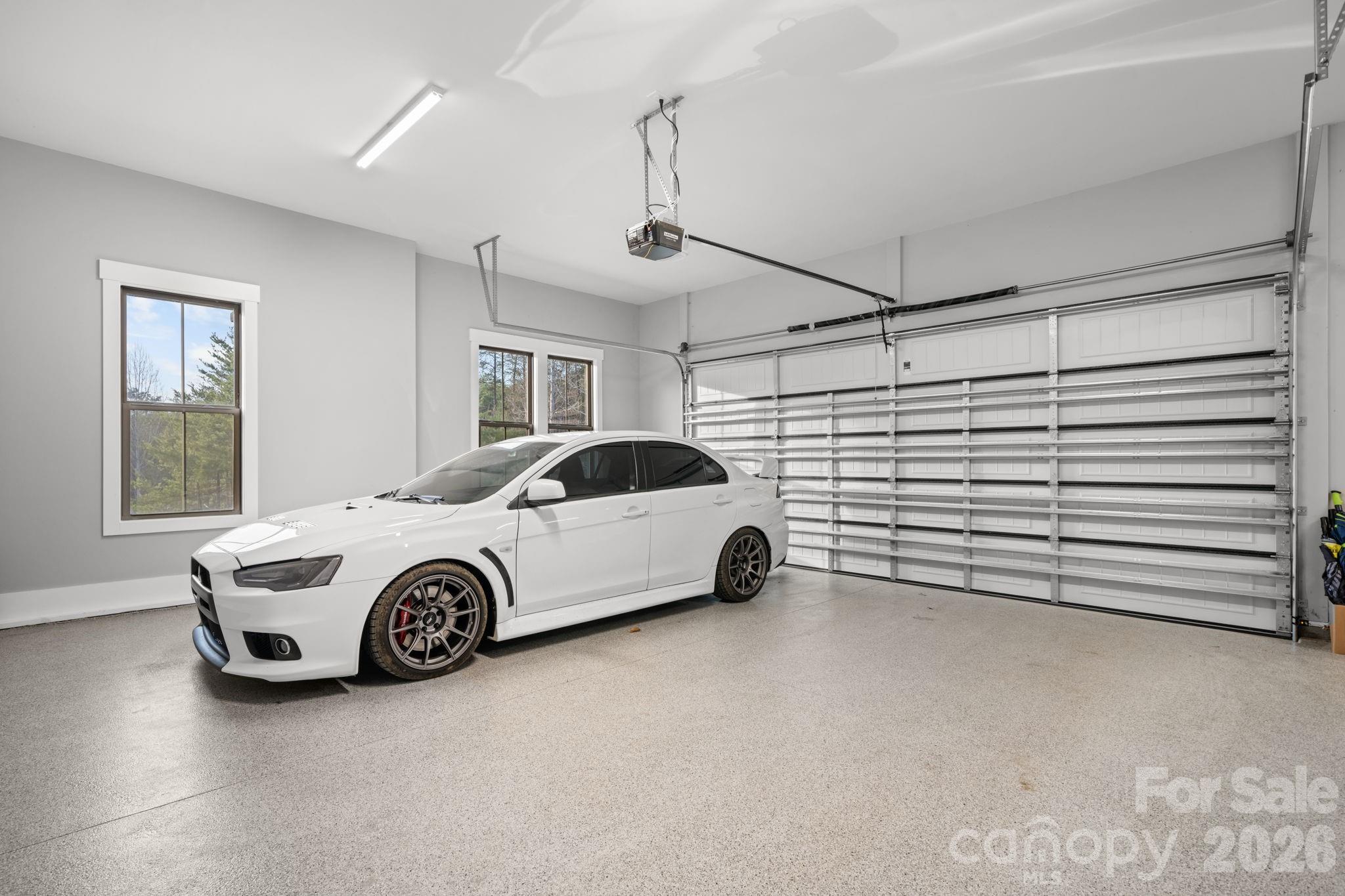 7269 Savannah Denver, NC 28037 - Photo 44 of 48 a car parked in a room next to a window