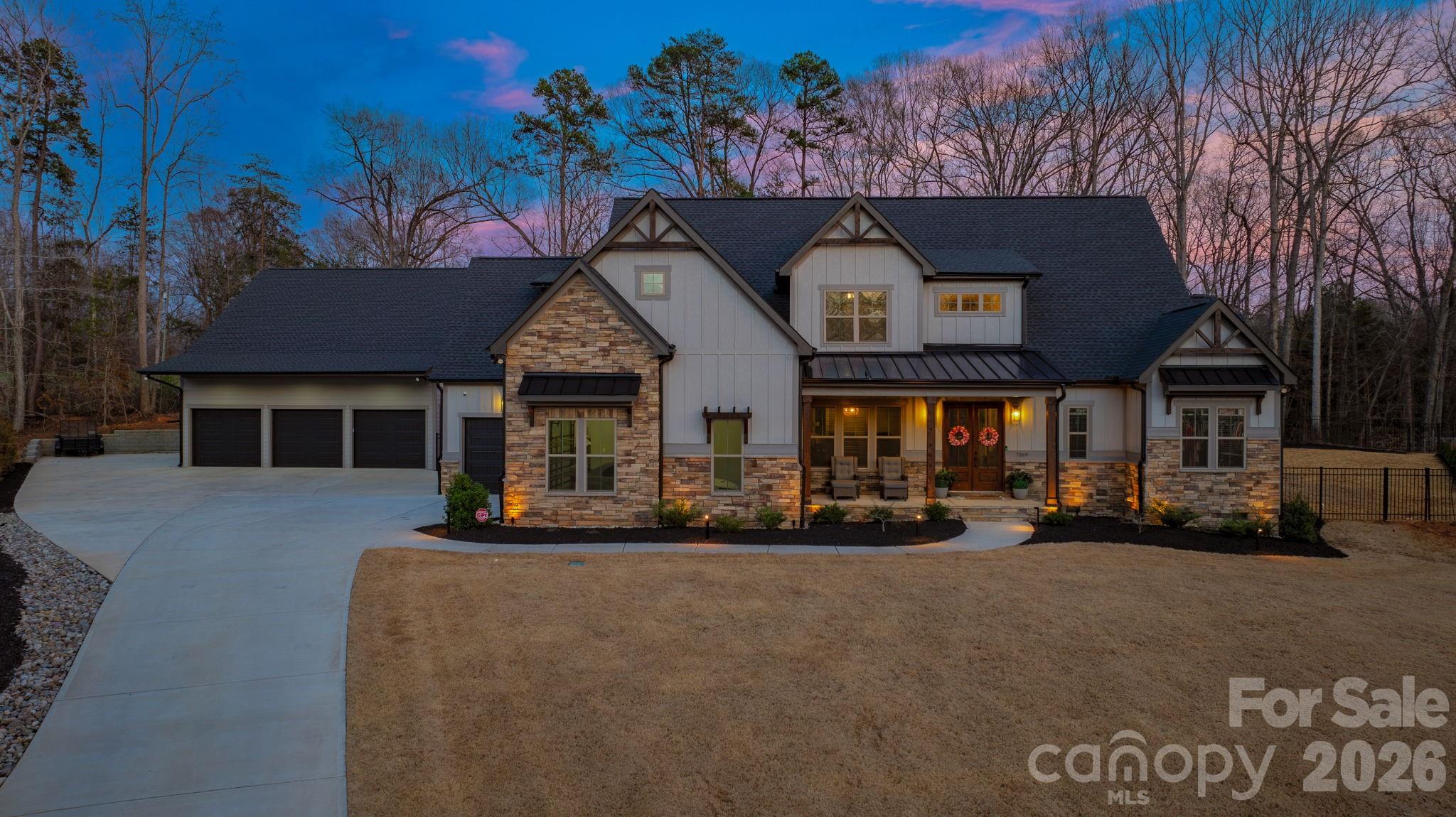 7269 Savannah Denver, NC 28037 - Photo 46 of 48 a front view of a house with a yard