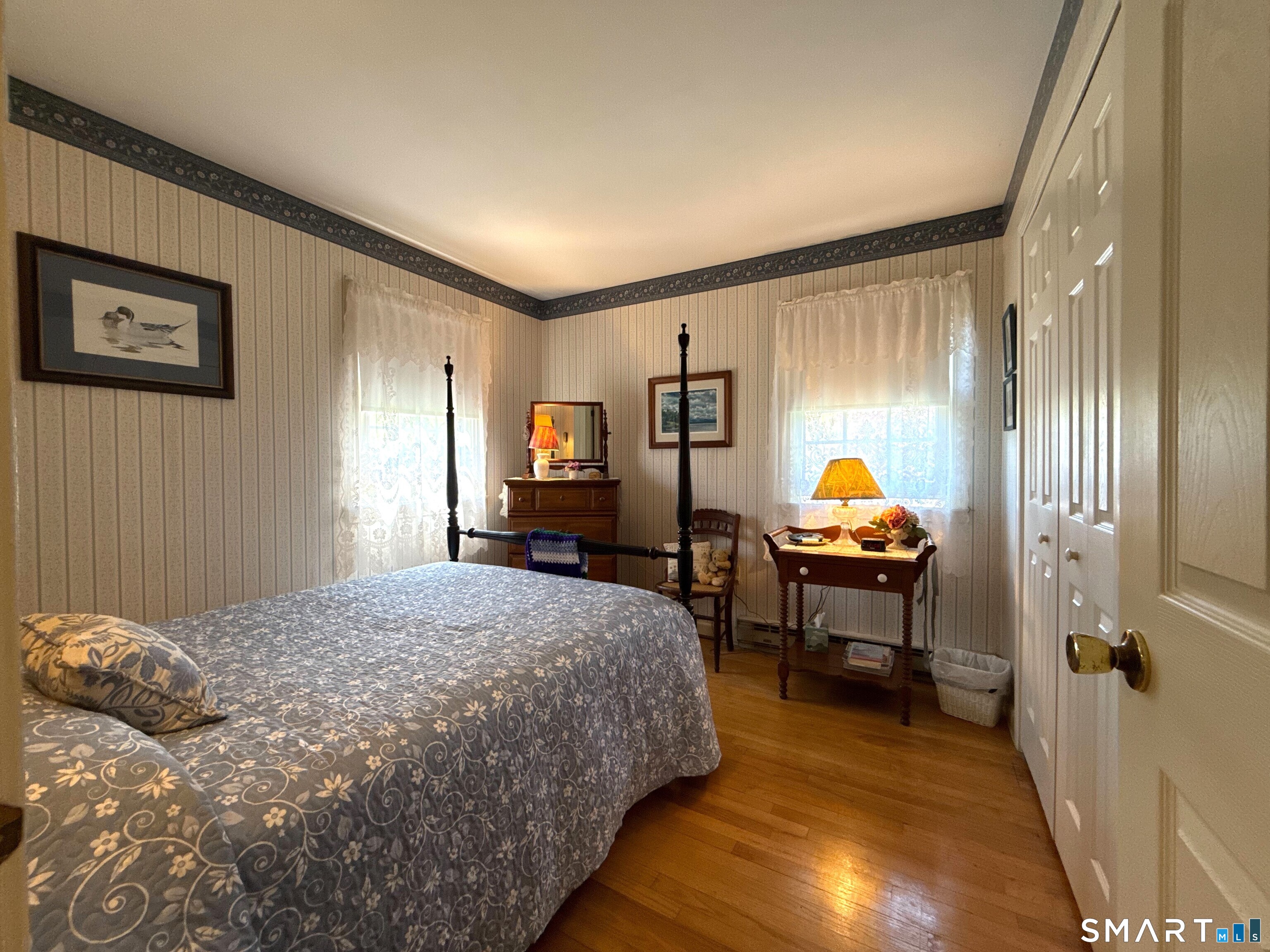 15 Grove Street Deep River, CT 06417 - Photo 14 of 25 a bedroom with a bed and a window