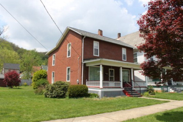 641 Liberty Street Franklin, PA 16323 - Photo 1 of 1 a front view of a house with a yard
