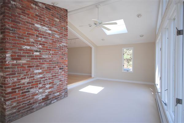 9 Alpine Road Wayland, MA 01778 - Photo 4 of 16 a view of empty room with windows