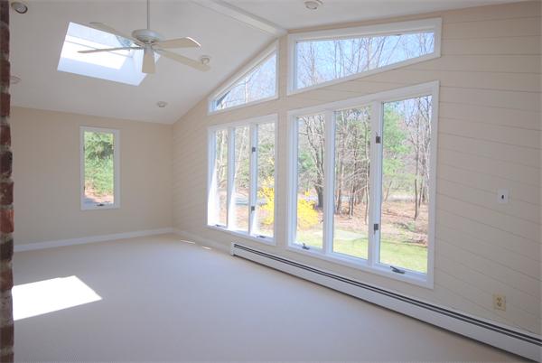 9 Alpine Road Wayland, MA 01778 - Photo 6 of 16 a view of an empty room with a window