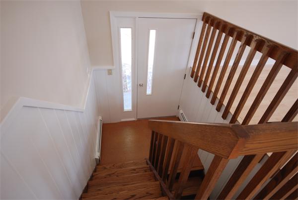 9 Alpine Road Wayland, MA 01778 - Photo 7 of 16 a view of a room with staircase
