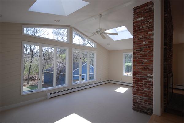 9 Alpine Road Wayland, MA 01778 - Photo 8 of 16 a view of an empty room with a window