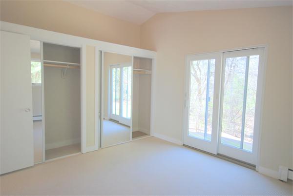 9 Alpine Road Wayland, MA 01778 - Photo 9 of 16 a view of an empty room with a window