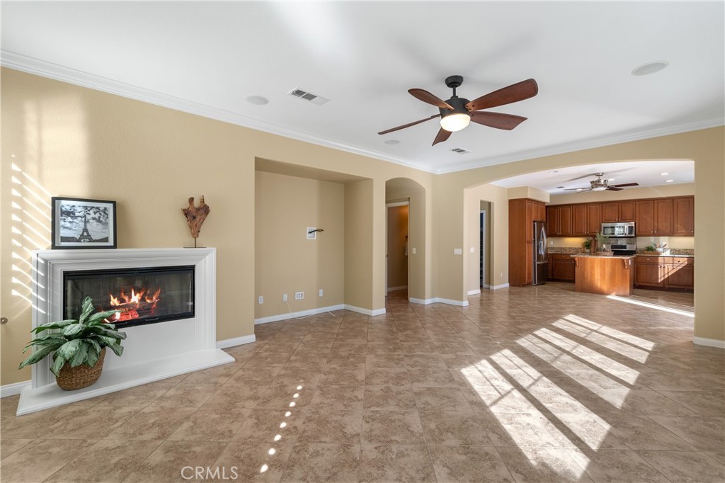 28817 Edenton Way Temecula, CA 92591 - Photo 2 of 56 a view of livingroom and fireplace with furniture