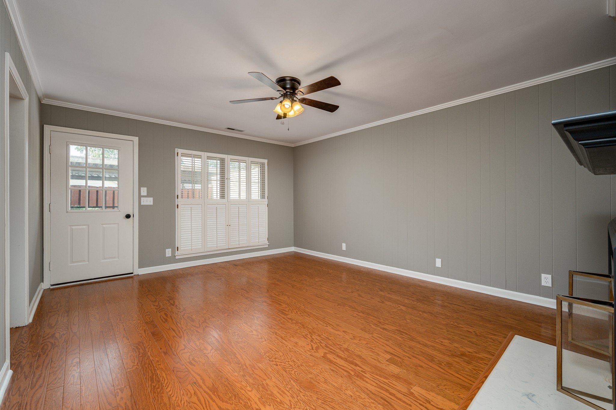 942 General George Patton Road Nashville, TN 37221 - Photo 13 of 23 a view of an empty room with window and wooden floor