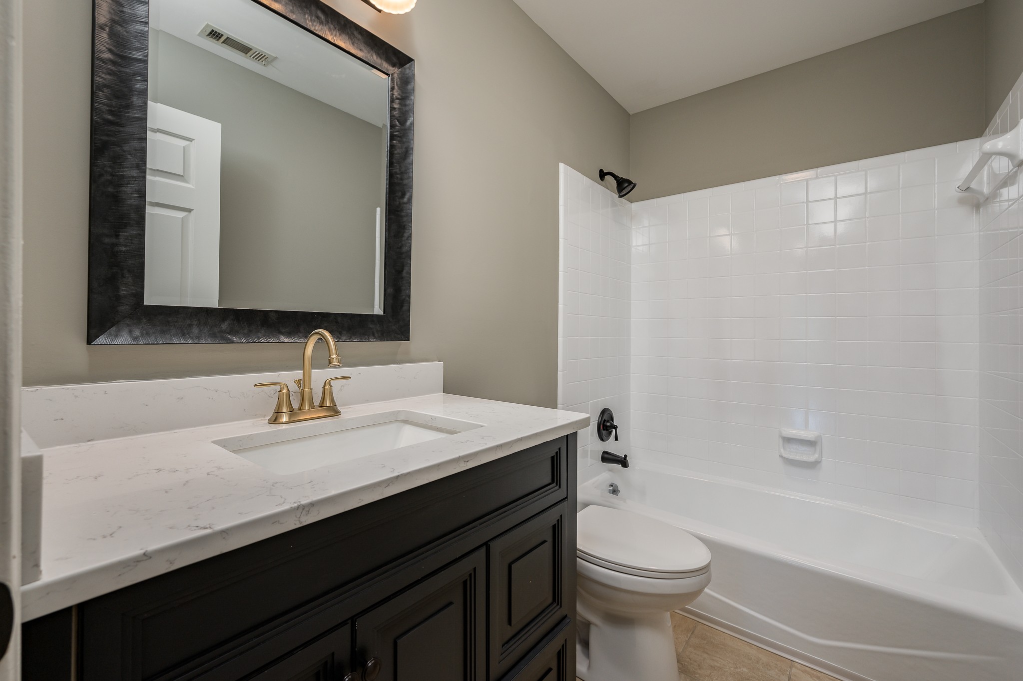 942 General George Patton Road Nashville, TN 37221 - Photo 15 of 23 a bathroom with a sink a toilet and shower