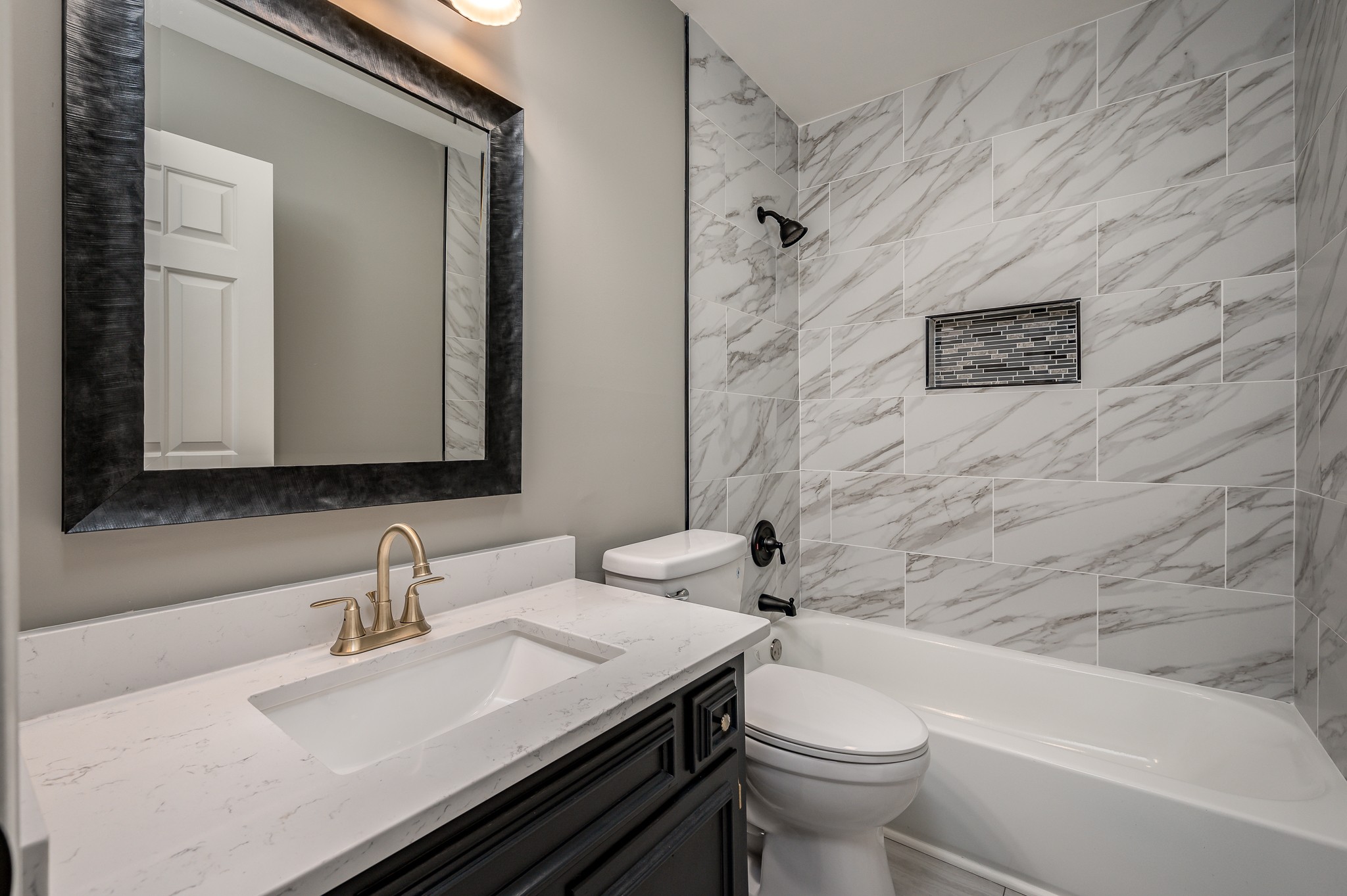 942 General George Patton Road Nashville, TN 37221 - Photo 17 of 23 a bathroom with a sink and a toilet