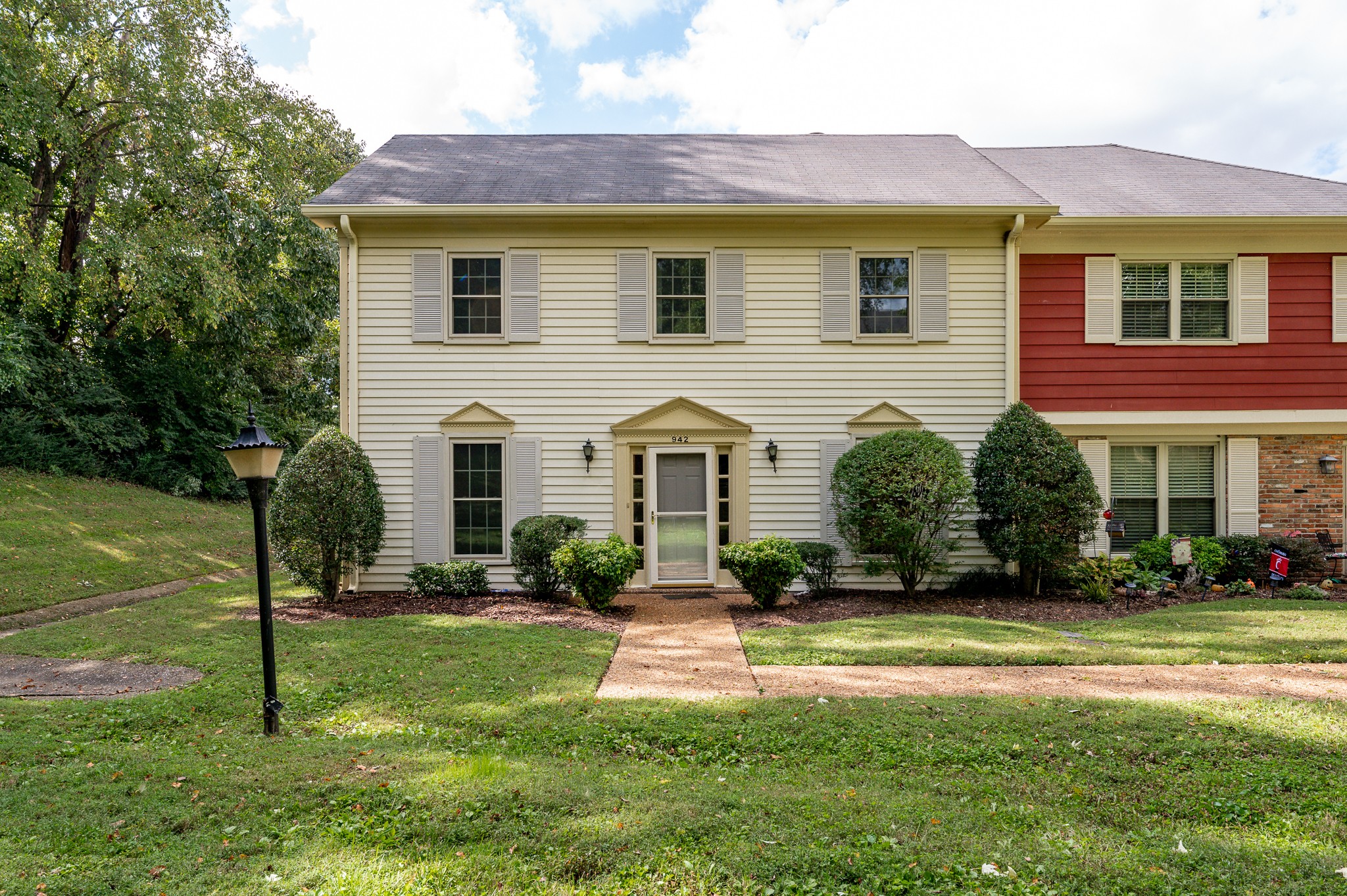 942 General George Patton Road Nashville, TN 37221 - Photo 3 of 23 a front view of a house with a yard