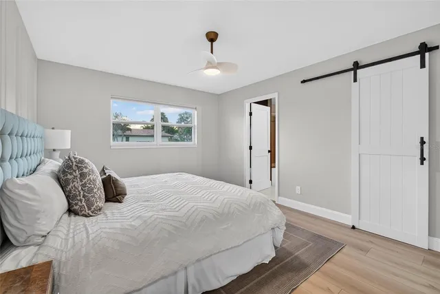a view of a livingroom with furniture and a fireplace