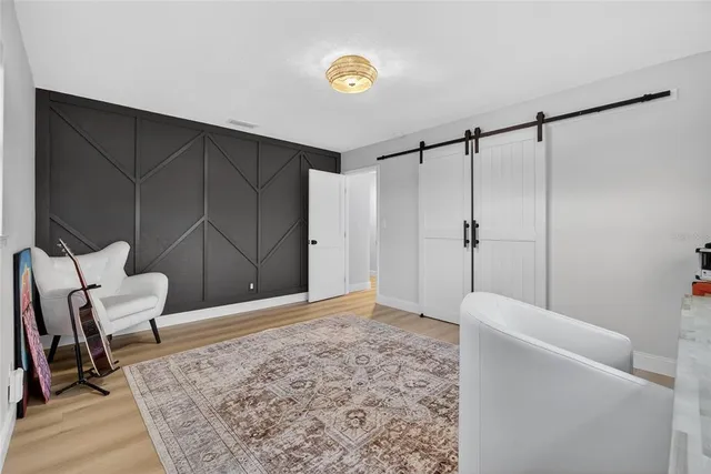 an aerial view of residential building and lake