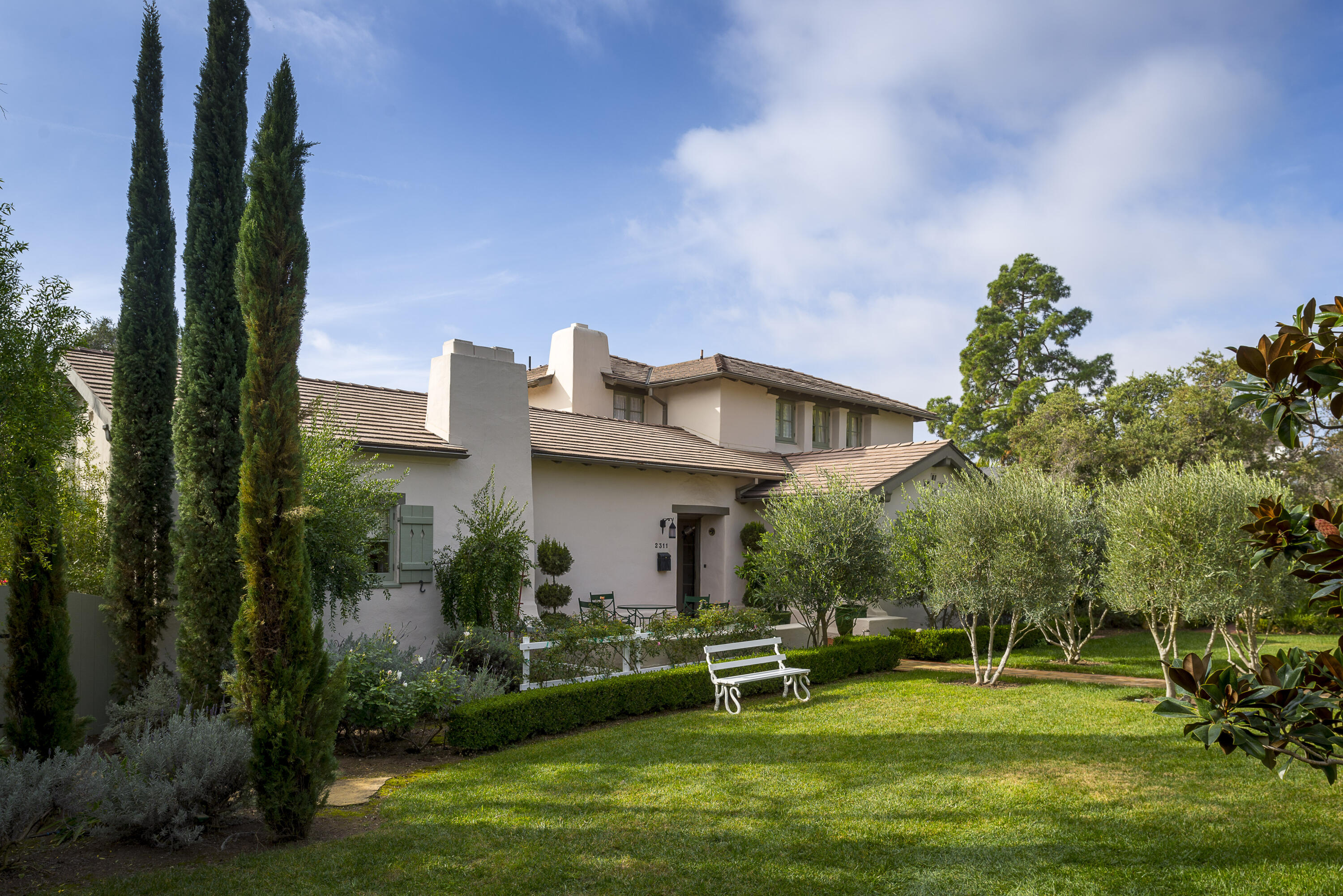 2311 Santa Barbara Street Santa Barbara, CA 93105 - Photo 2 of 20 a front view of a house with a garden and plants