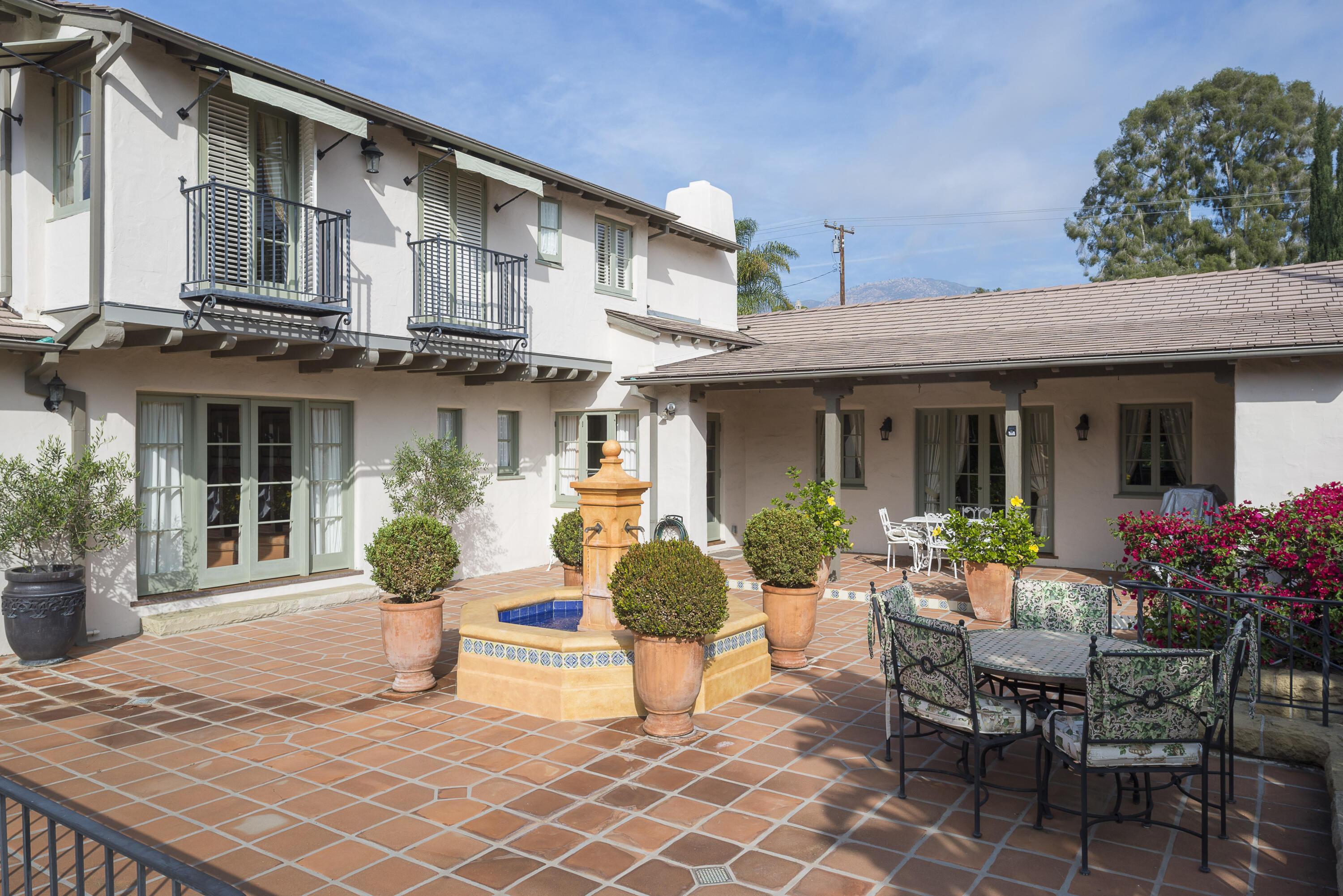 2311 Santa Barbara Street Santa Barbara, CA 93105 - Photo 4 of 20 a view of a house with backyard sitting area and porch