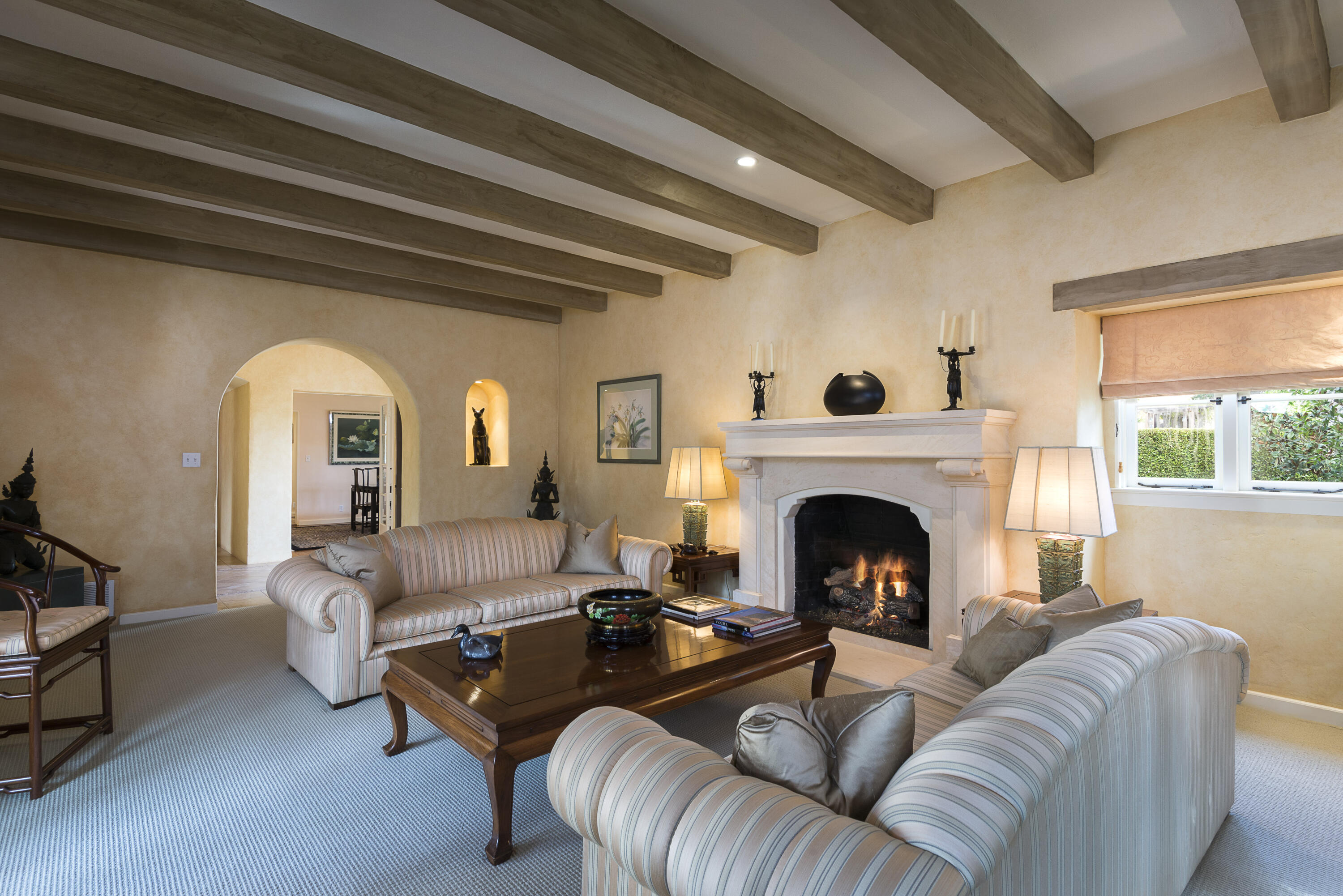 2311 Santa Barbara Street Santa Barbara, CA 93105 - Photo 5 of 20 a living room with furniture and a fireplace