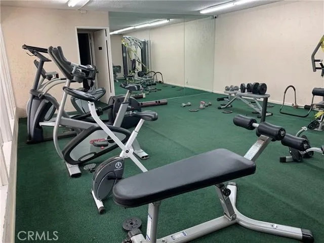 a room with lots of chairs and equipment