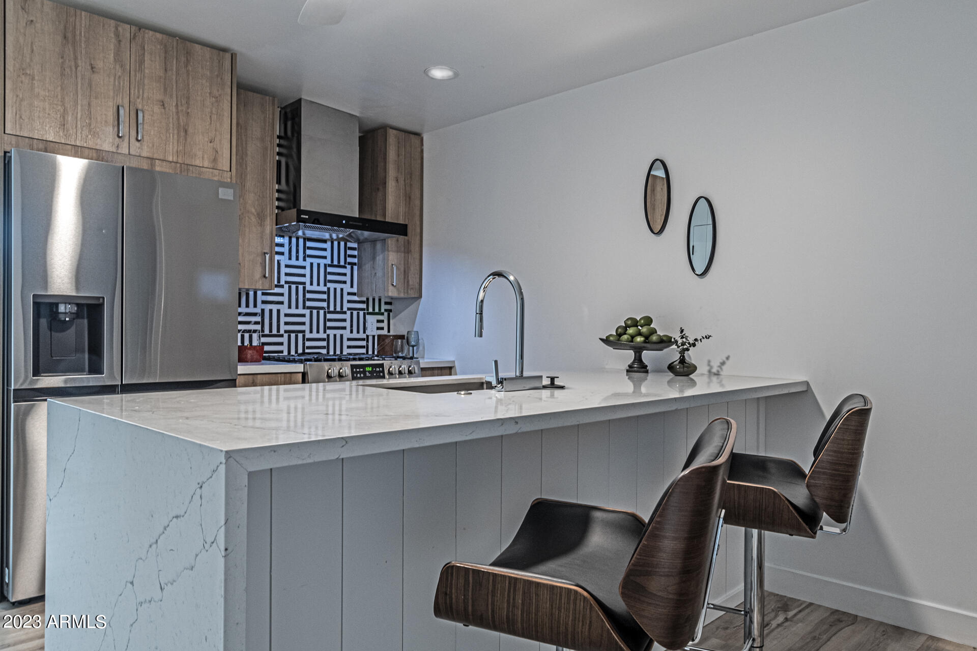 1539 West Puget Avenue Phoenix, AZ 85021 - Photo 18 of 27 a view of kitchen island sink and refrigerator
