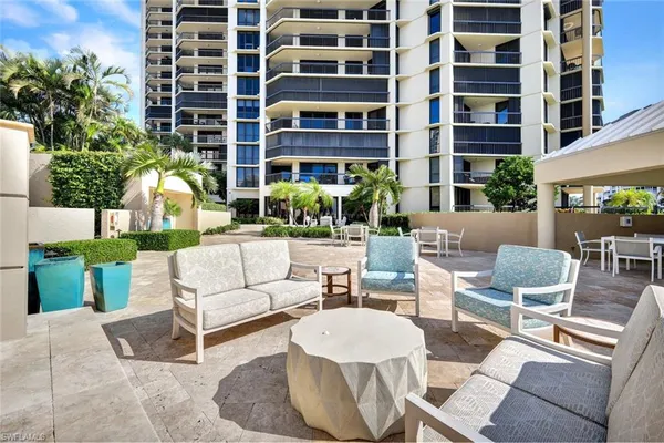 a building outdoor space with patio furniture