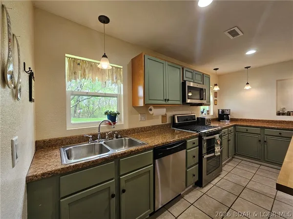 $419,000 | 1014 Railroad Pond Road, Eldon, MO 65026