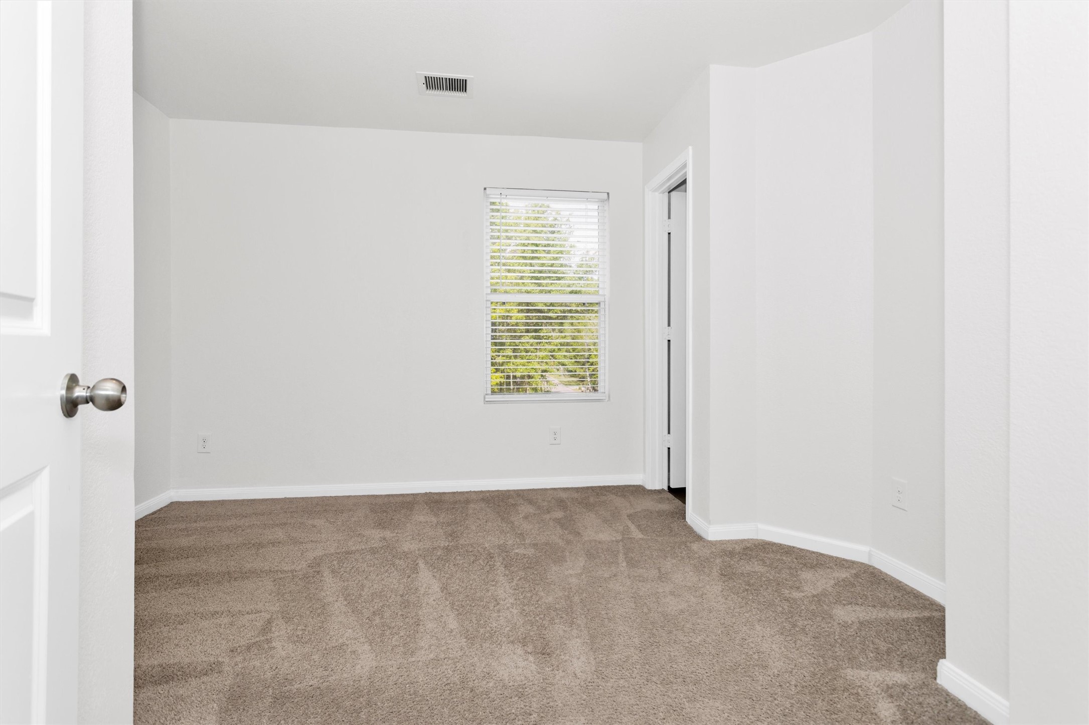 15134 Austin Road Willis, TX 77378 - Photo 11 of 20 an empty room with windows