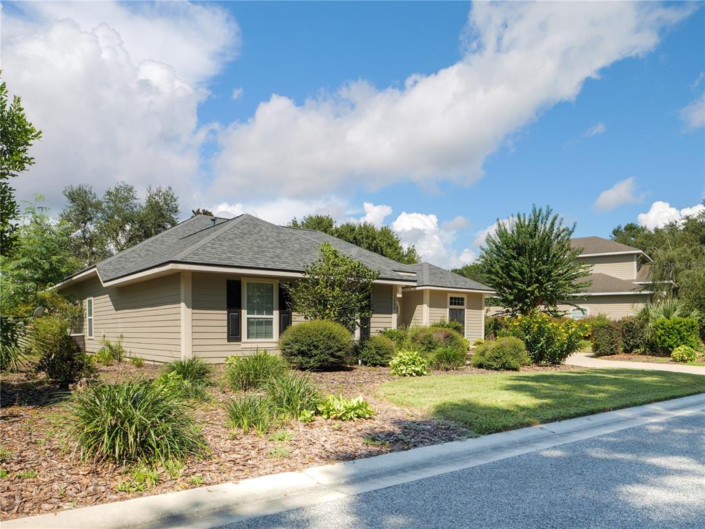 1488 Southwest 84th Terrace Gainesville, FL 32607 - Photo 31 of 31 a front view of house with yard and green space